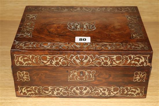 A Victorian rosewood and mother of pearl work box and sewing accessories 12 x 28cm